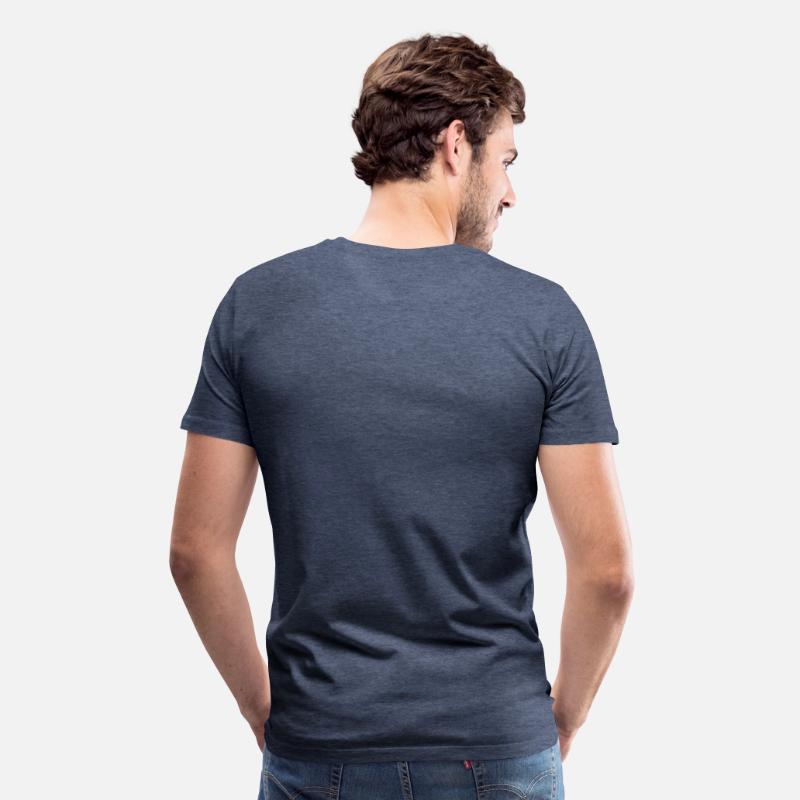 A man wear tuxedo standing next to a woman a dress