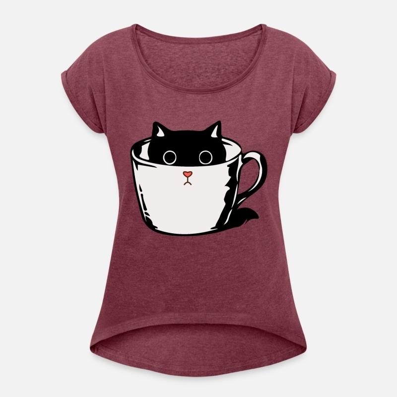 Black kitten with red nose hiding in a cup